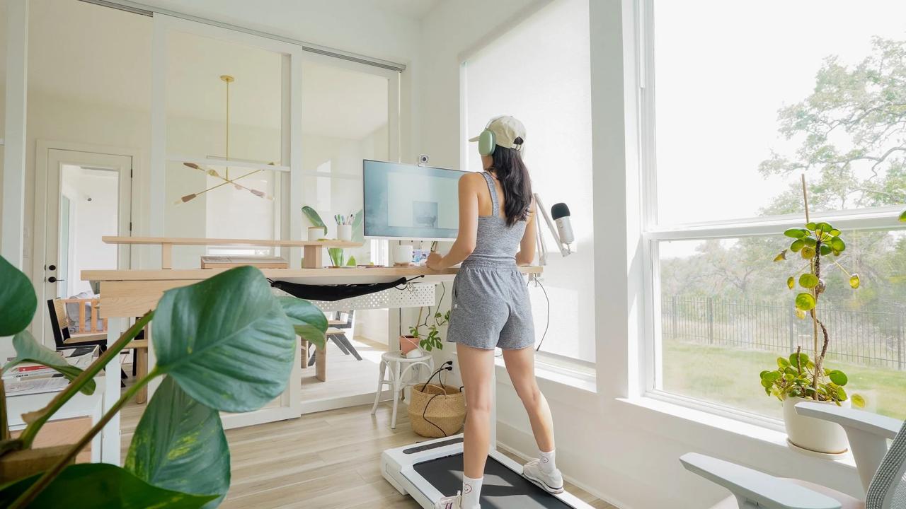 Photorealistic close-up lifestyle photo of an older adult’s legs and shoes walking in a bright indoor hallway, soft natural light, calm modern aesthetic, no logos, no text